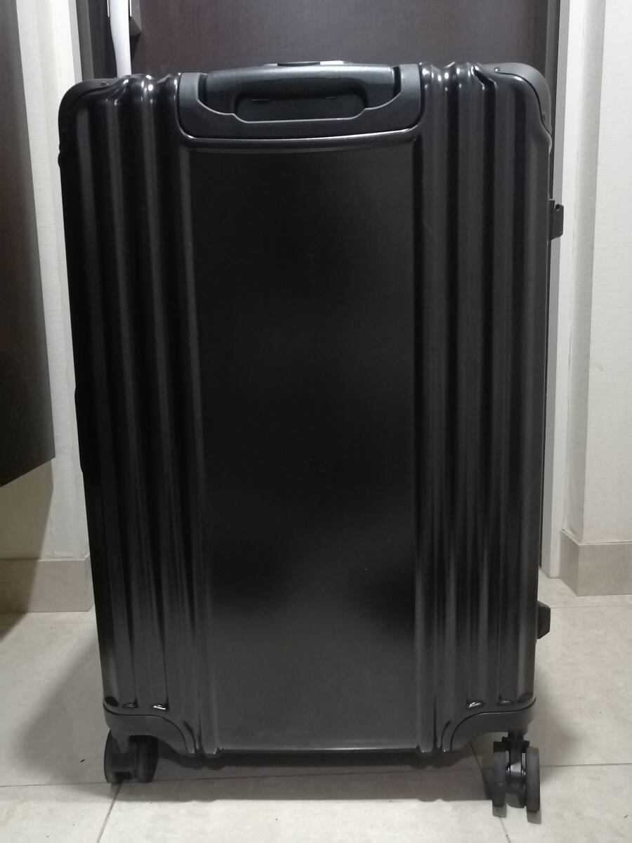 大型スーツケース、黒、ナンバーロック２個所。3泊旅行に一度使用_画像1