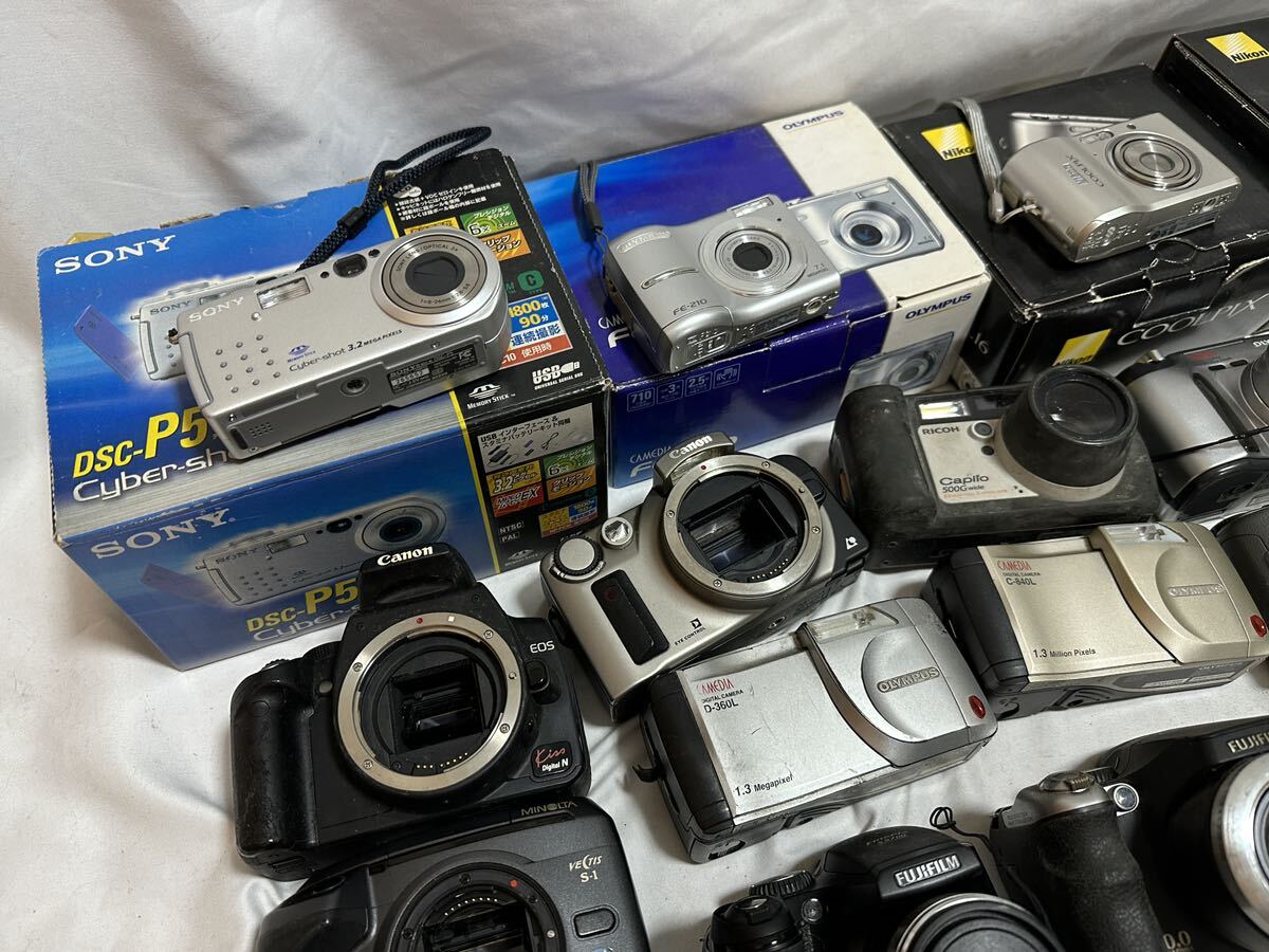 デジ2484①★ジャンク品 デジタルカメラ 65個まとめ Canon IXY CASIO EXLIM Nikon COOLPIX FinePix sony cyber-shot Panasonic LUMIXの画像2