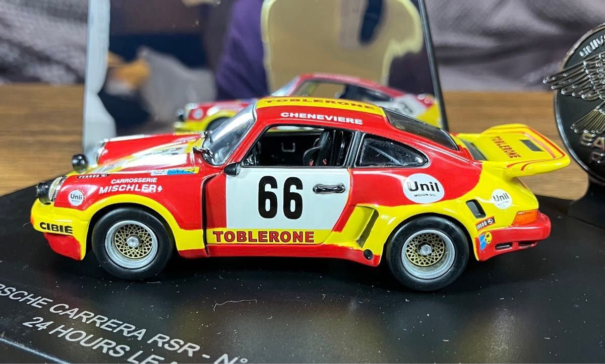 ユニバーサルホビーズ 1/43 ポルシェ カレラ RSR ーN°66“TOBLERONE” 24時間 ル・マン 1974 ミニカー