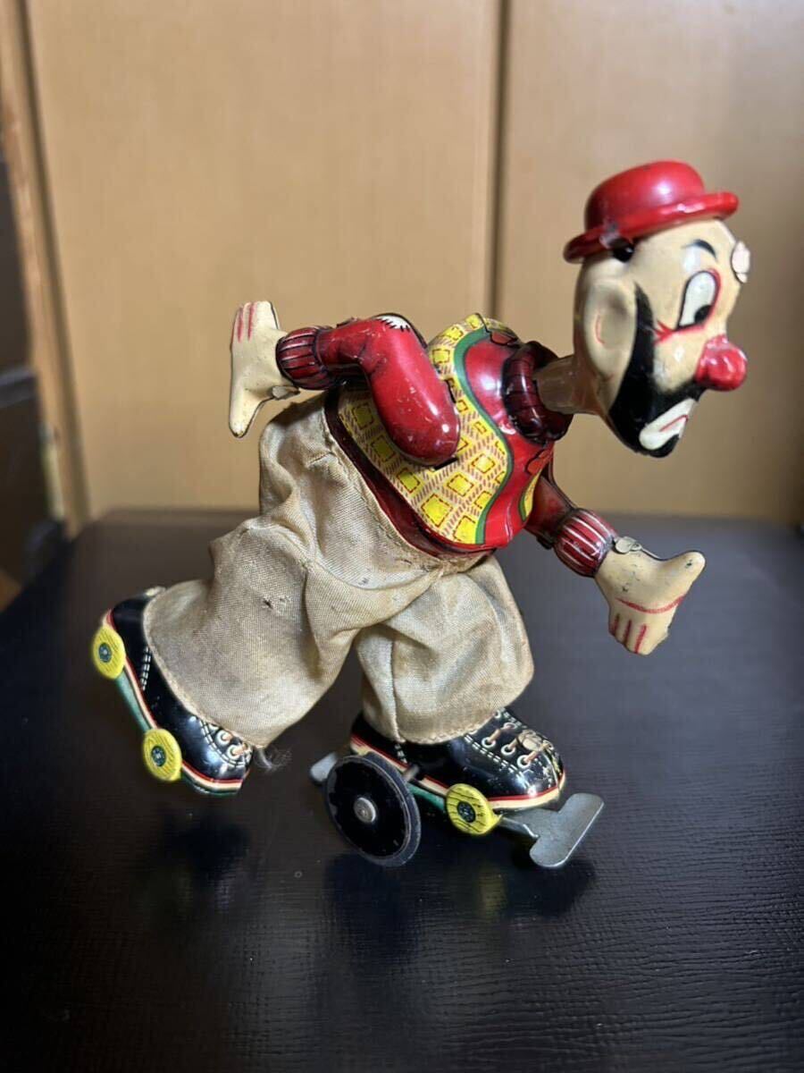 TPS taupe re made roller skate piero tin plate. toy zen my drive 