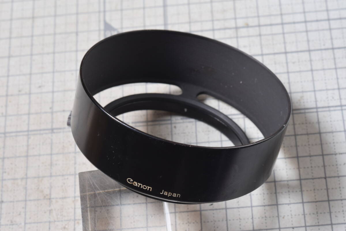 ＃882  金属製フード フィルター径55ｍｍに適合 横ねじ締め付け方式 CANON 50mm1.2の画像1