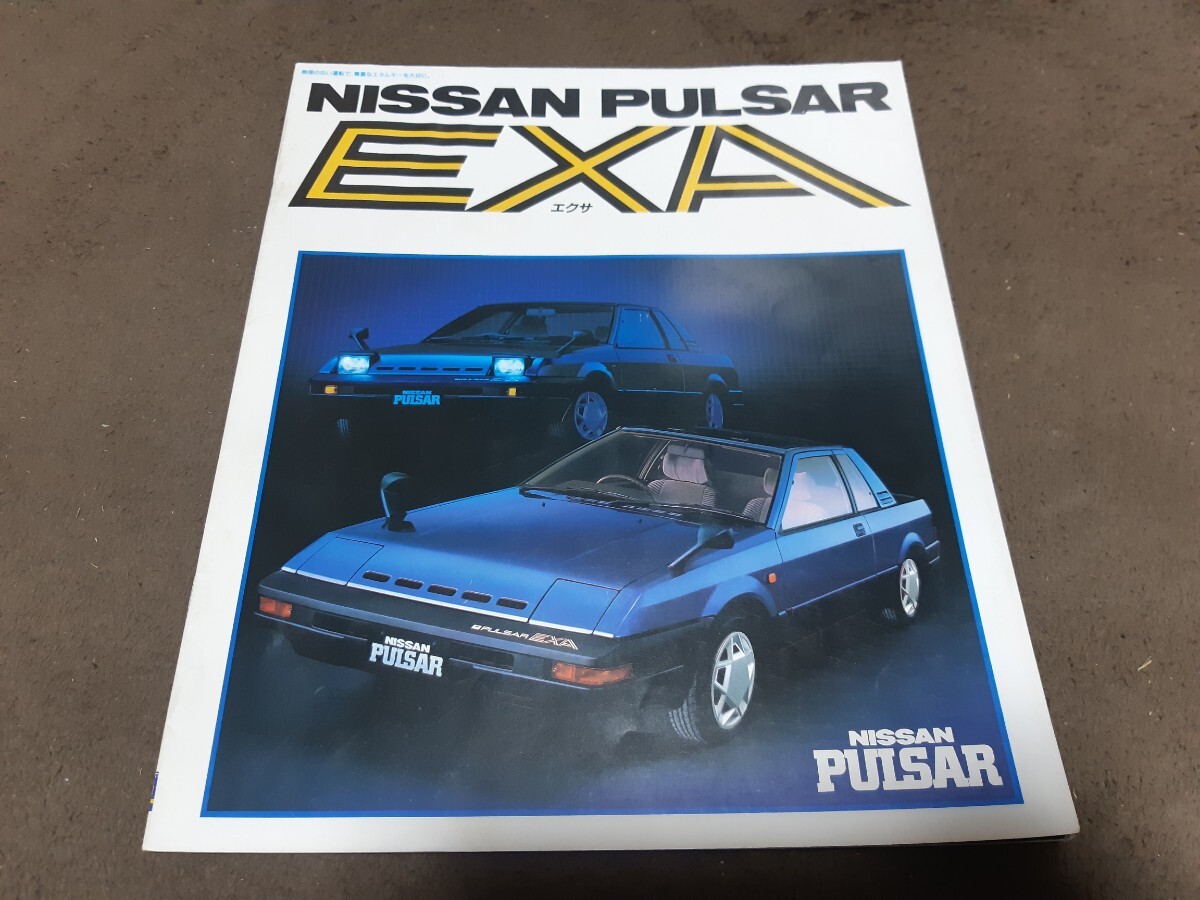  Nissan Pulsar Exa S57/04 версия старый машина каталог влажность по причине помятость есть.
