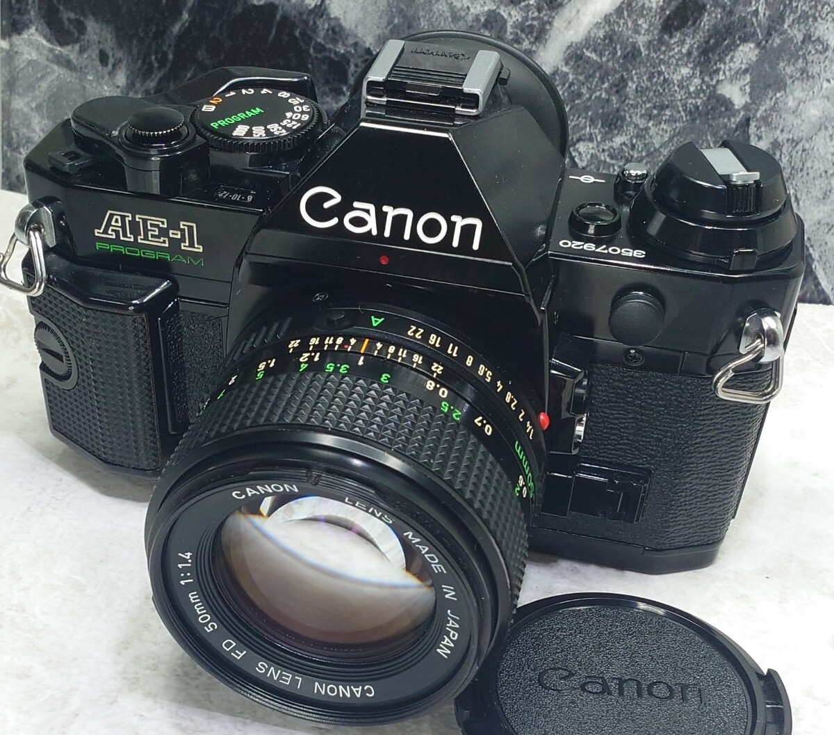 【整備済収集品】 Canon AE-1 Program 美品＋NEW FD 50mm f1.4 大口径単焦点セット 各動作良好 露出計メーターOK 持病シャッター鳴きなしの画像1