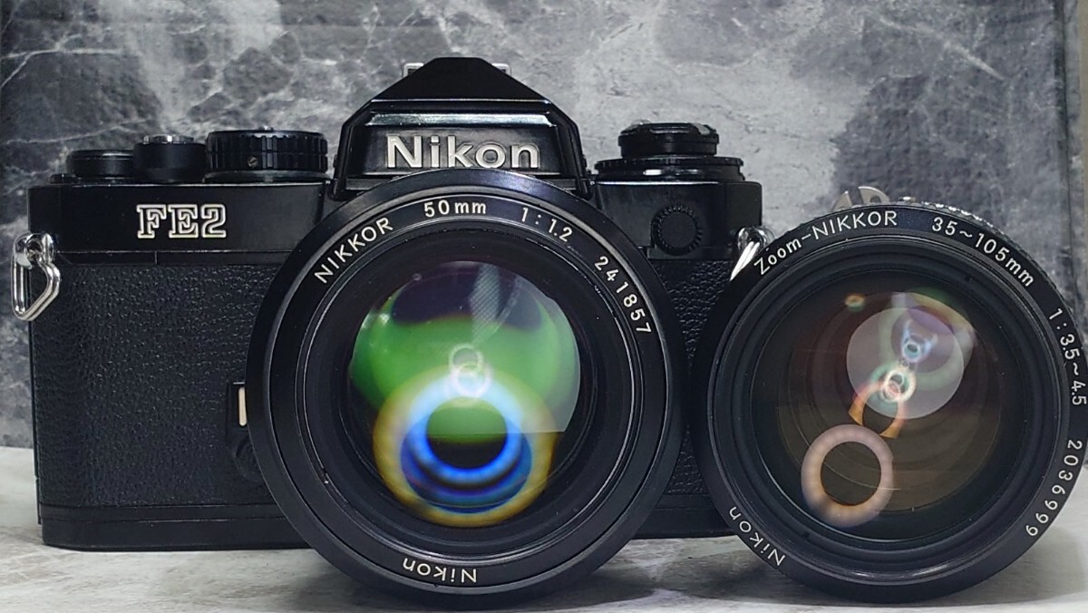 【終活コレクション整理】 Nikon FE2黒＋Ai NIKKOR 50mm f1.2 シンデレラ＋35-105mm マクロ付ズーム 各動作良好 露出計OK レンズ光学良好の画像1