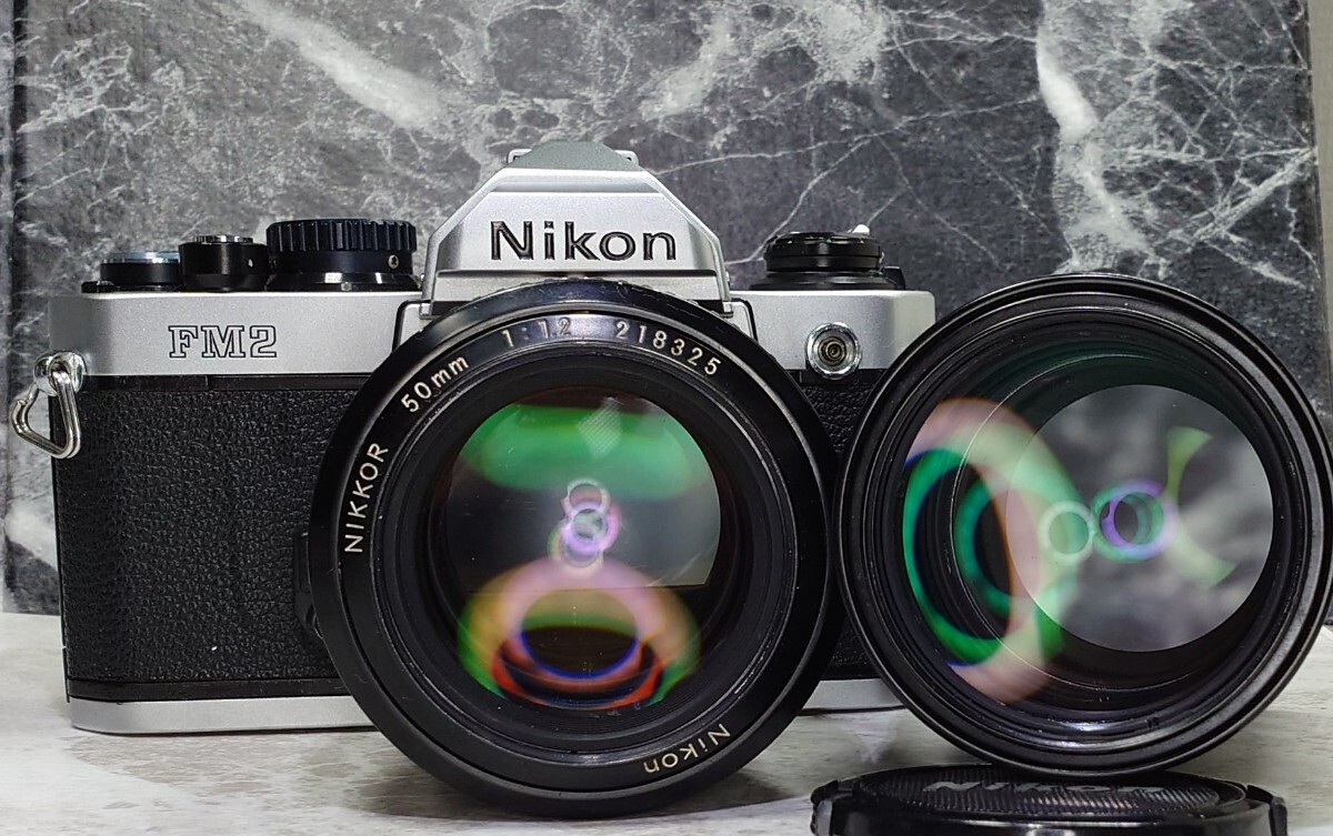【終活整理】Nikon NEW FM2＋Ai NIKKOR 50mm f1.2 シンデレラ＋135mm f2.8 単焦点2本セット 各動作良好 露出計OK レンズ光学良好 ニコン_画像1