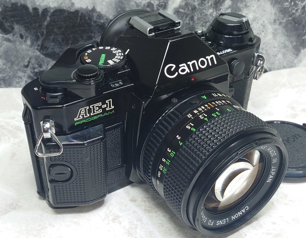 【整備済収集品】 Canon AE-1 Program 美品＋NEW FD 50mm f1.4 大口径単焦点セット 各動作良好 露出計メーターOK 持病シャッター鳴きなしの画像3