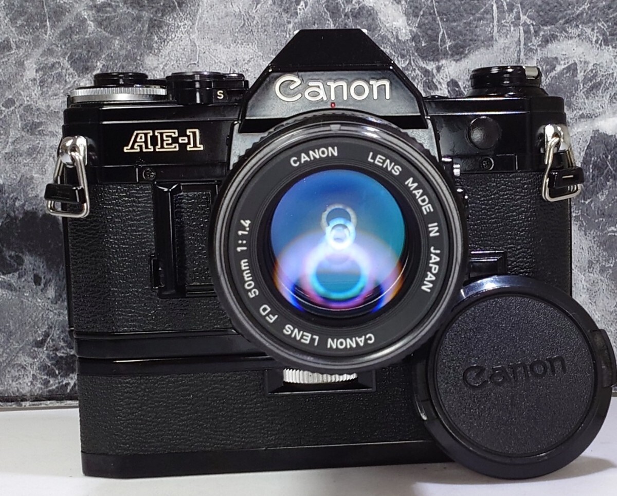 【終活コレクション整理】 Canon AE-1 黒＋NEW FD 50mm f1.4＋ワインダーA 各動作良好 露出計メーターOK 連写OK 持病シャッター鳴きなしの画像2