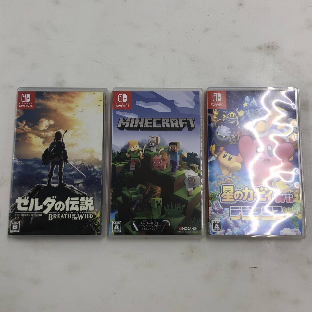 【1円～】Nintendo Switch スイッチソフト3本セット(ゼルダの伝説 ブレスオブザワイルド マイクラ 星のカービィ Wii デラックス)【中古品】の画像1