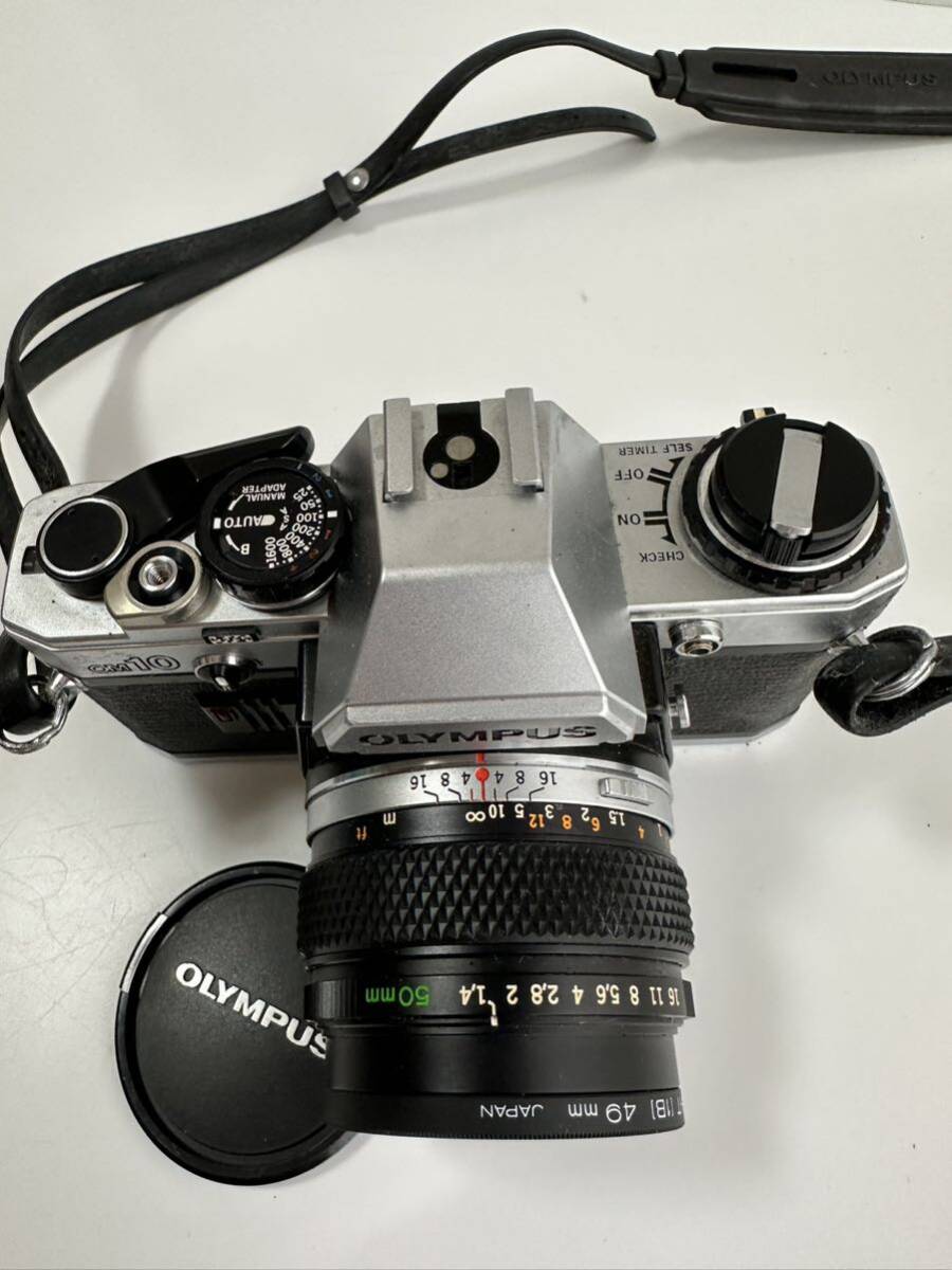 OLYMPUS オリンパス 一眼レフ フィルムカメラ OM10 OM-SYSTEM ZUIKO MC AUTO-S 1:1.4 f=50mm Kenko SKYLIGHT 1B 49mm の画像2