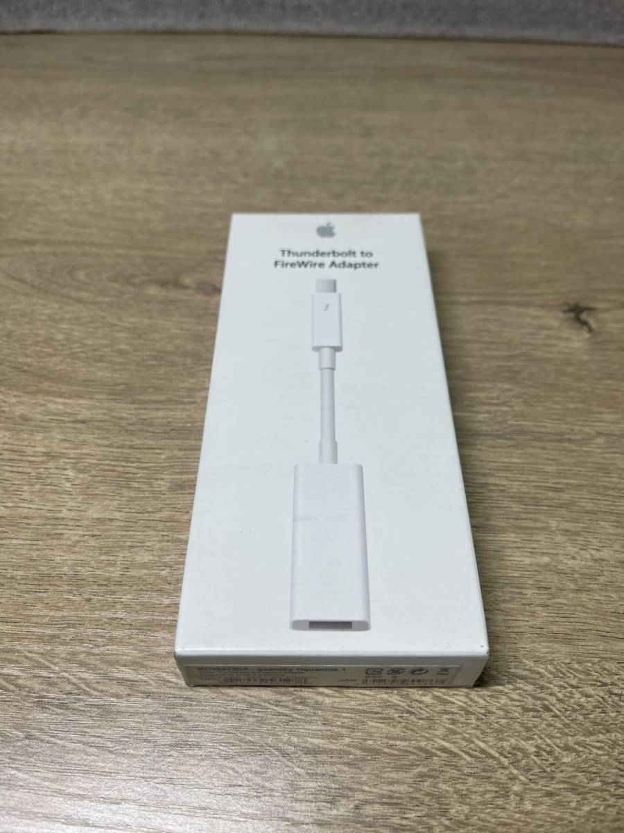 アップル FireWire変換アダプタ [Thunderbolt オス→メス FireWire] Apple Thunderbolt - FireWireアダプタ MD464ZM/A未使用・箱痛み品の画像1