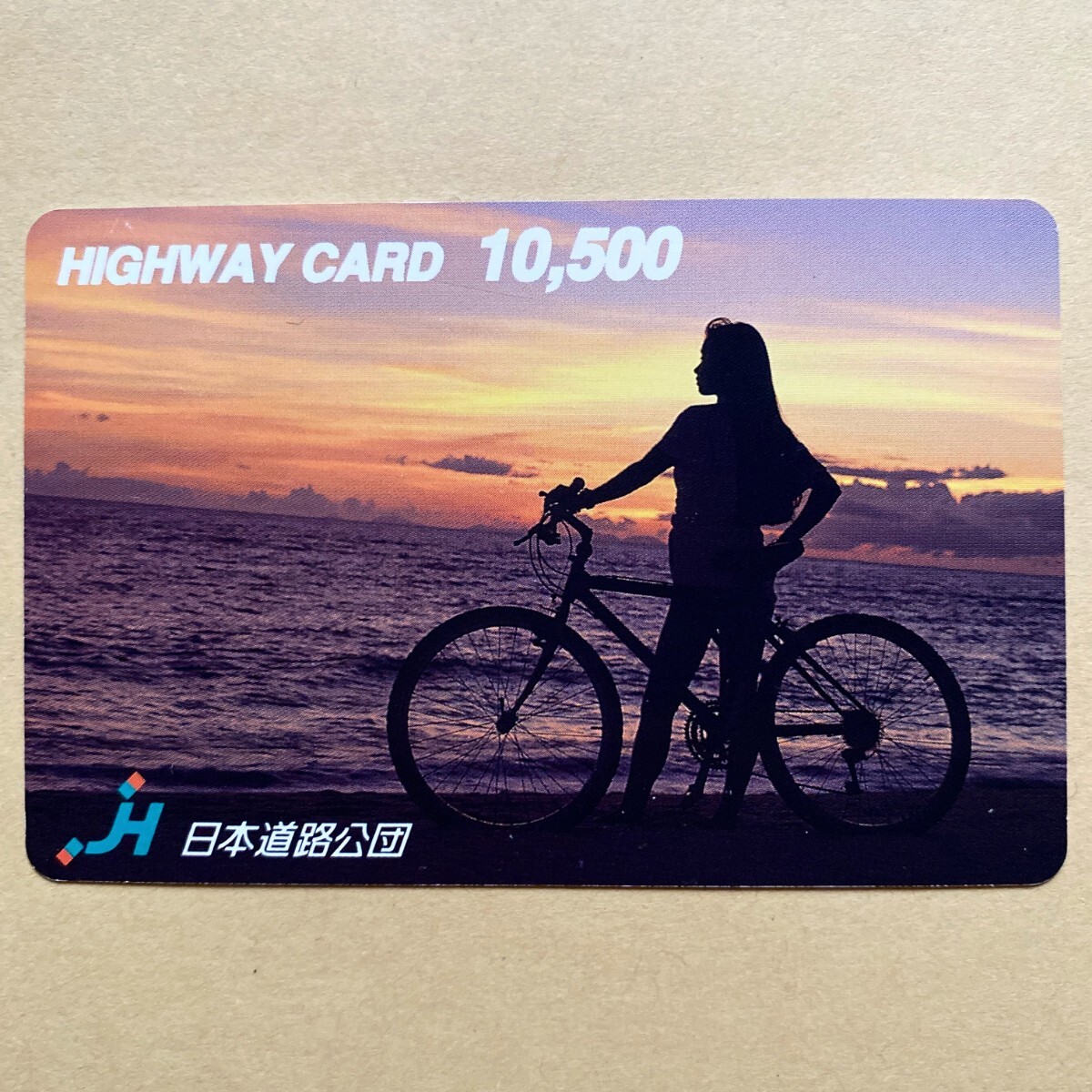 [ used ] highway card Japan road .. sea side woman .. bicycle 