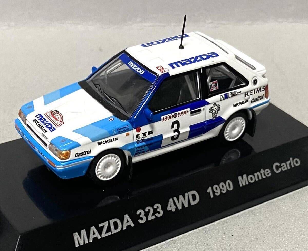 CM'S ラリーカーコレクション SS.15 MAZDA 323 4WD No.3 T.サロネン 1990 WRCラリーモンテカルロ 8位_画像1