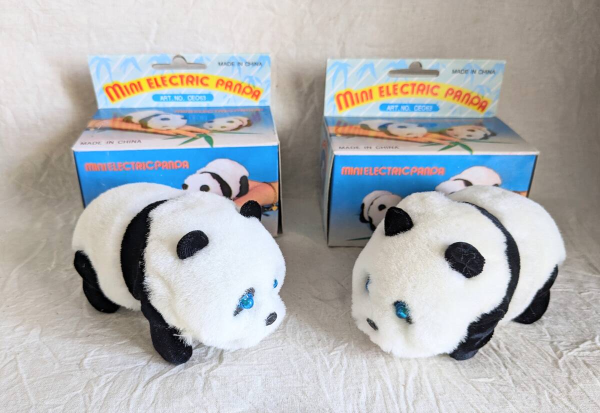 2 piece set * beautiful goods * Mini electric Panda * melody ...* eyes . shines * soft toy *