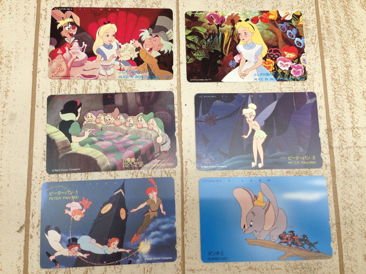 * Disney telephone card 6 point mystery. country. Alice Tinkerbell Snow White Dumbo Peter Pan 2P57 [60]