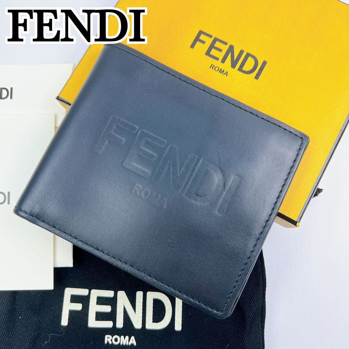 1円〜 FENDI フェンディ 二つ折り財布 二つ折り 財布 レザー ブラック 札入れ カード入れ ズッカ柄 エンボス ブラック 黒色 メンズ 革_画像1