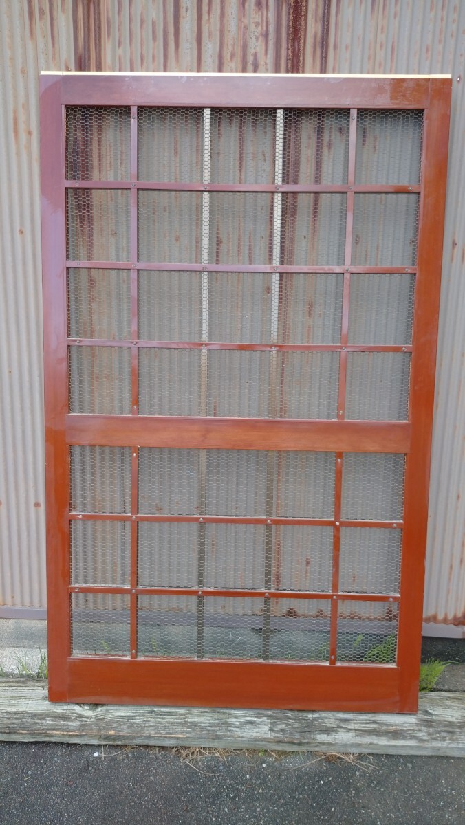 { peace } warehouse door ( inside door wire‐netting ) wooden table. . is aluminium. old Japanese-style house store clean 