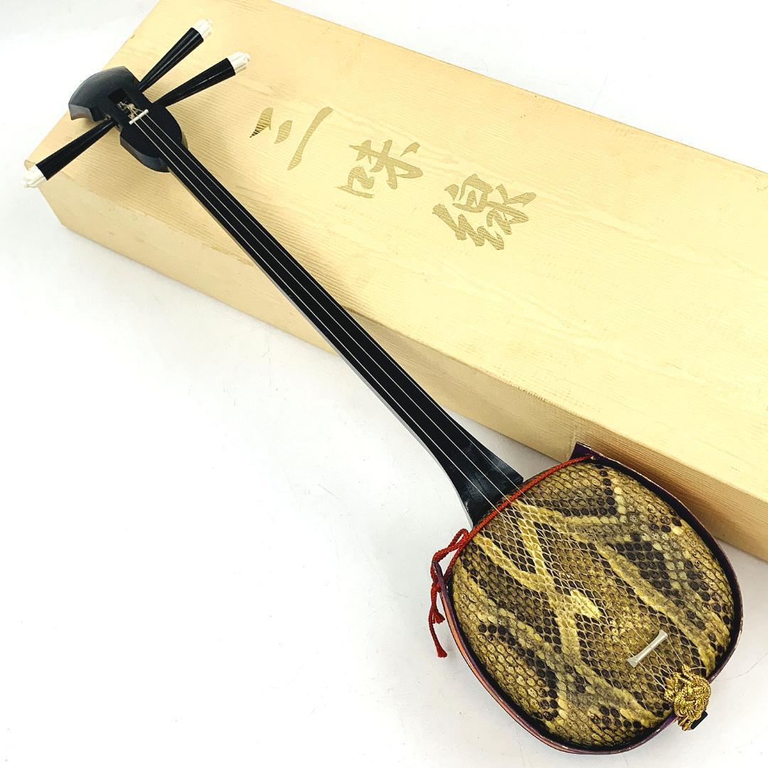  Okinawa sanshin . leather .. musical instruments traditional Japanese musical instrument original box attached [ worker inspection goods sound out operation verification ending ]