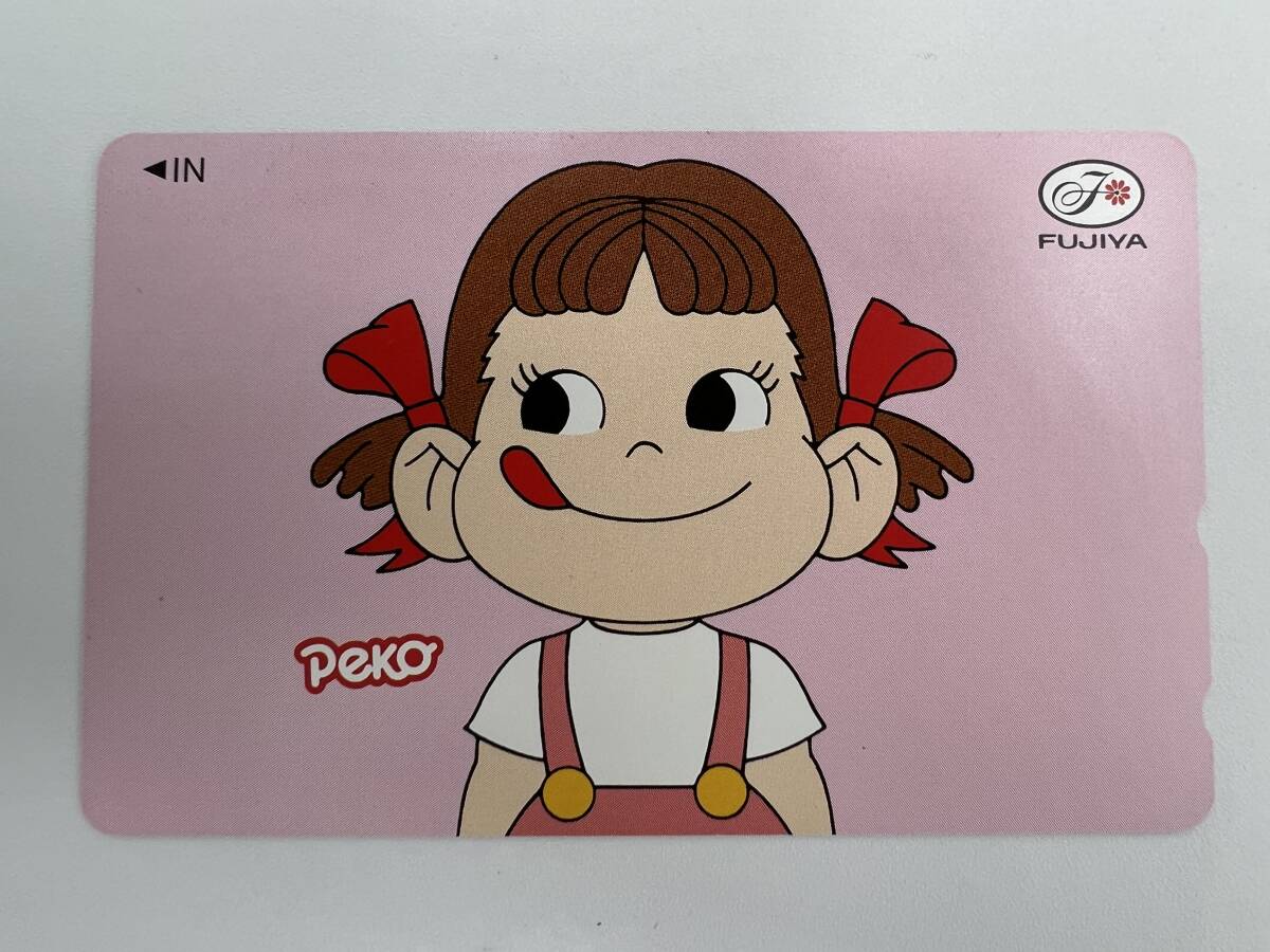 未使用 現状品 テレカ 50度 ペコちゃん Peko テレホンカード_画像1