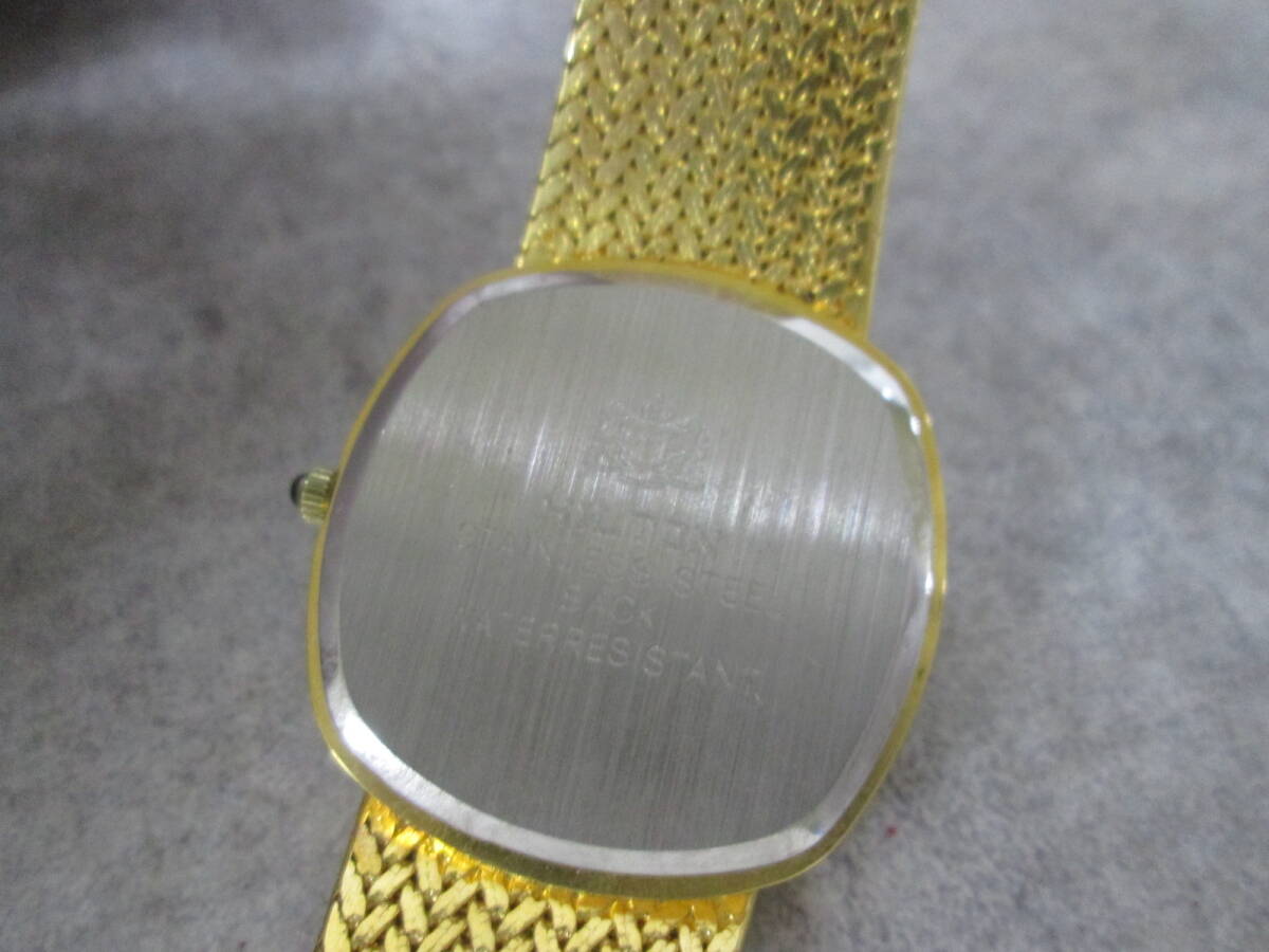 【n S0866】HILTON ヒルトン メンズ腕時計 クォーツ ゴールドカラー ソフトケース/保証書付き_画像4