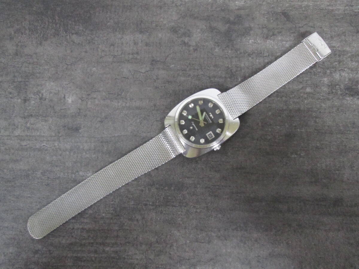 【n F0913】TECHNOS Supercron テクノス スーパークロン 腕時計 自動巻き デイト 黒文字盤の画像1