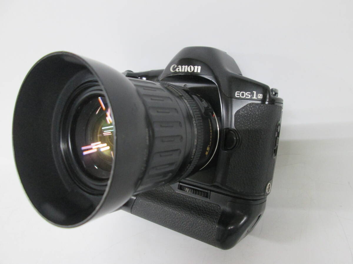 【h Y0944】 CANON キヤノン EOS-1N フィルムカメラ EF35-135mm 1:4-5.6 EW-62 簡単動作OK 詳細動作未 レンズ フィルムカメラ ジャンクの画像1