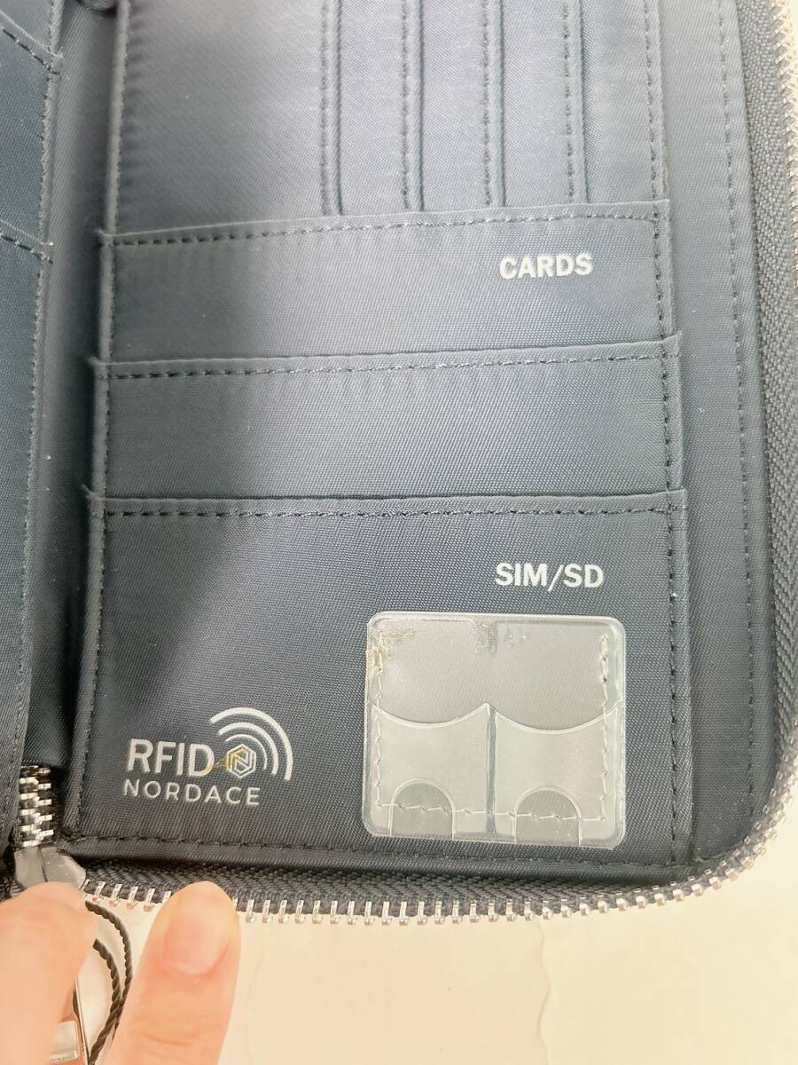 【訳あり 新品未使用】Nordace Siena トラベルウォレット スマート＆RFIDブロックウォレット ネイビー 財布 ノルディス 旅行 貴重品_内部にSDカード入れ付近に汚れがあります