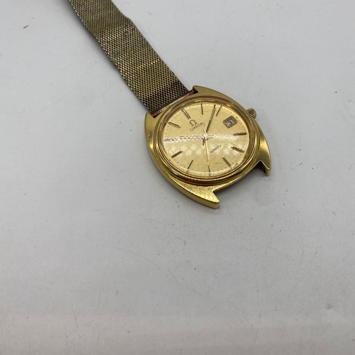 exH0018 OMEGA オメガ 196 0121 cal.1370 メンズクォーツ腕時計 ゴールドカラー ベルトなしジャンク の画像3