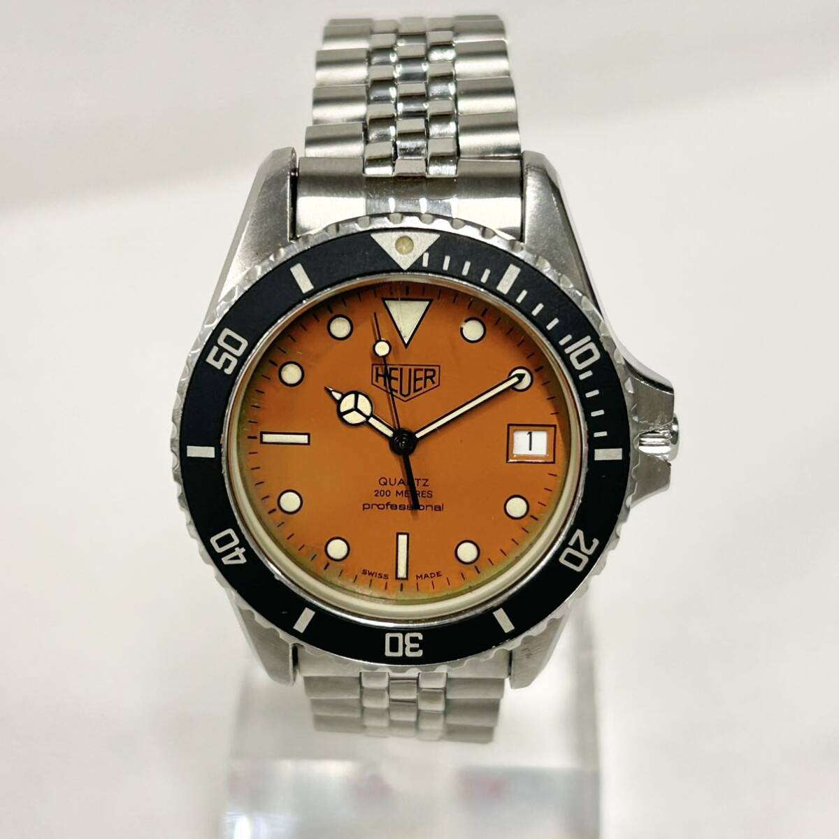 [ with translation ] Heuer 980.013 1000 series Professional 200M quartz Date orange face old Logo TAG Heuer TAG HEUER