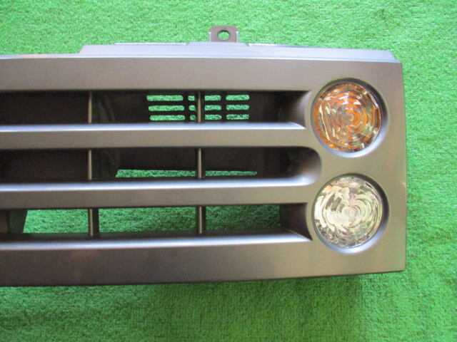 W6406# with guarantee # Cube YGZ11## front grille ## turn signal attaching #H18 year # Miyagi prefecture ~ shipping * Seino post outside fixed form A* gome private person NG/ shelves g