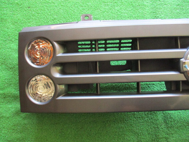 W6406# with guarantee # Cube YGZ11## front grille ## turn signal attaching #H18 year # Miyagi prefecture ~ shipping * Seino post outside fixed form A* gome private person NG/ shelves g