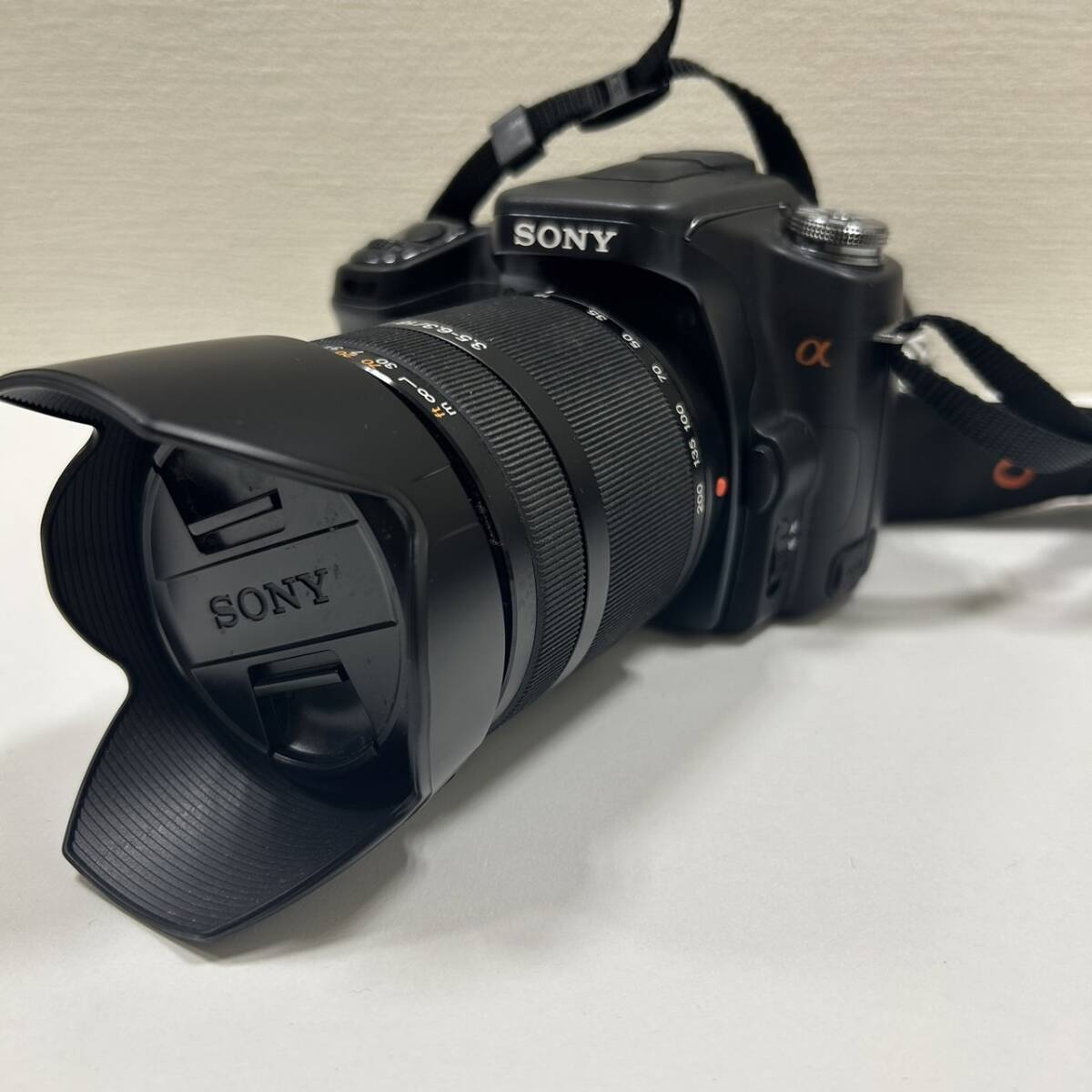 【ART-4482】SONY ソニー α100 DSLR-A100 ブラック レンズ DT3.5-6.3/18-200 デジタル一眼レフカメラ 元箱付き 付属品 ジャンク デジカメの画像9