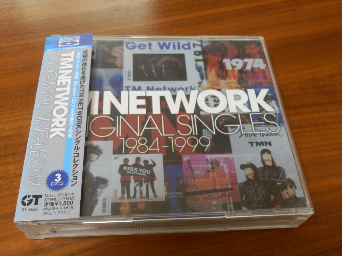 TM NETWORK CD3枚組ベストアルバム「ORIGINAL SINGLES 1984-1999」Blu-spec CD BEST TMN 小室哲哉 宇都宮隆 Get Wild レンタル落ち 帯ありの画像1