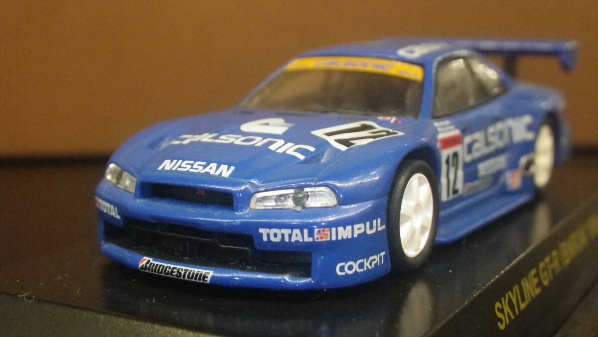 ジャンク品！ 1/64 カルソニック ミニカー コレクション スカイラインＧＴ-Ｒ（ＢＮＲ34）1999の画像1