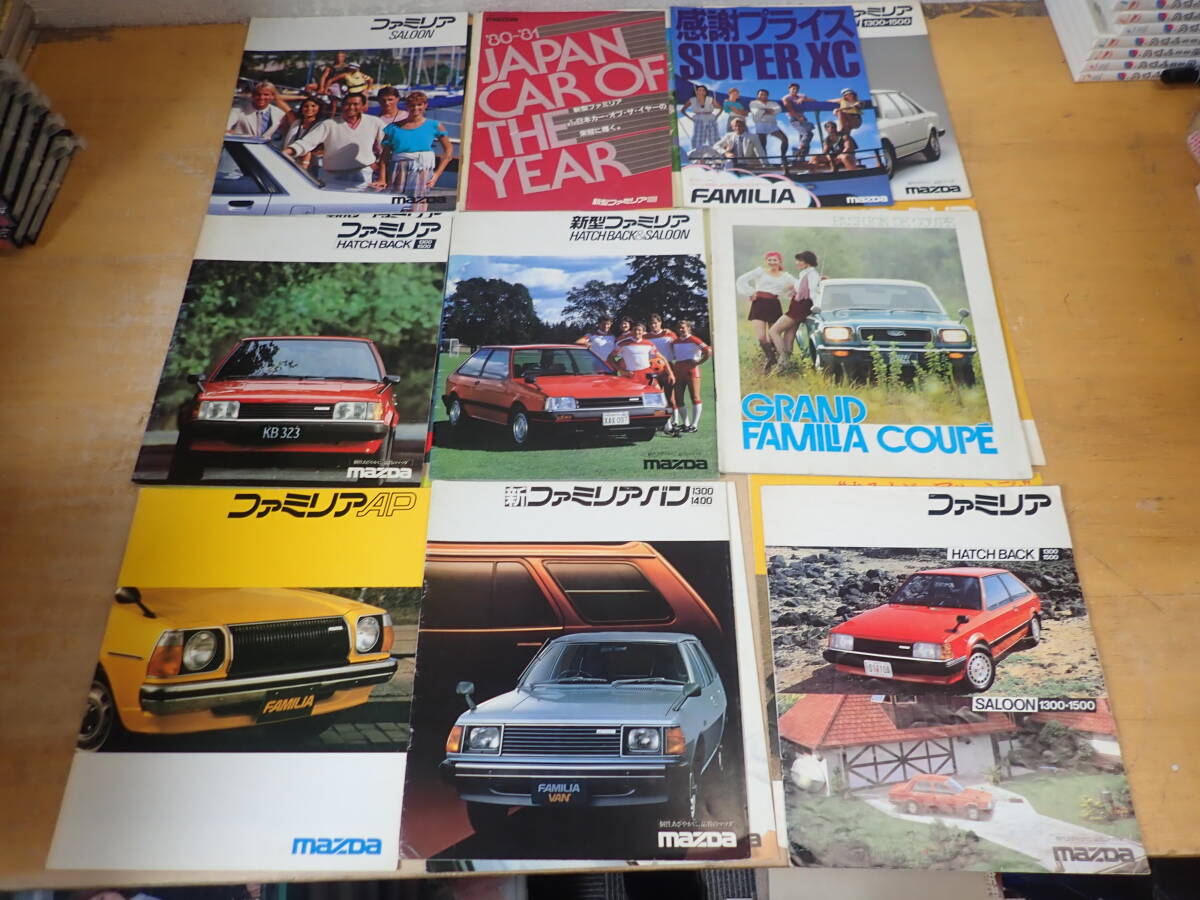 j12e large amount * Mazda Familia * Grand Familia old car catalog together 26 pcs. set Showa era / that time thing / saloon /AP/Deluxe/1000/ van 