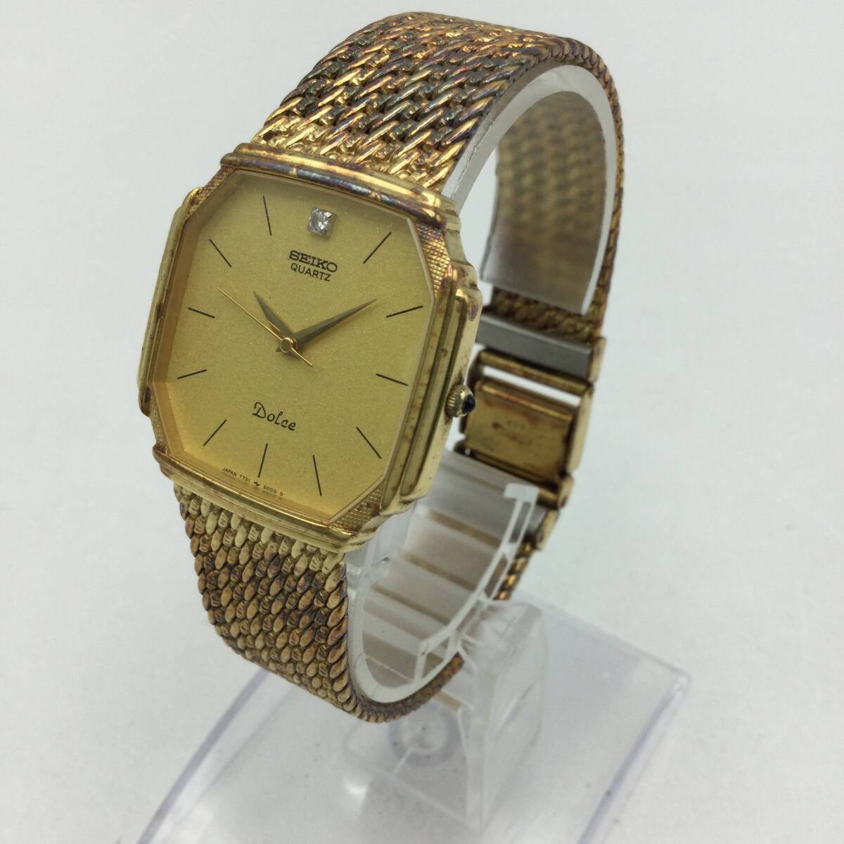 S76*[QZ/ immovable goods ]SEIKO Dolce Seiko Dolce quartz Gold color face 3 hands 7731-5000 men's wristwatch present condition goods *
