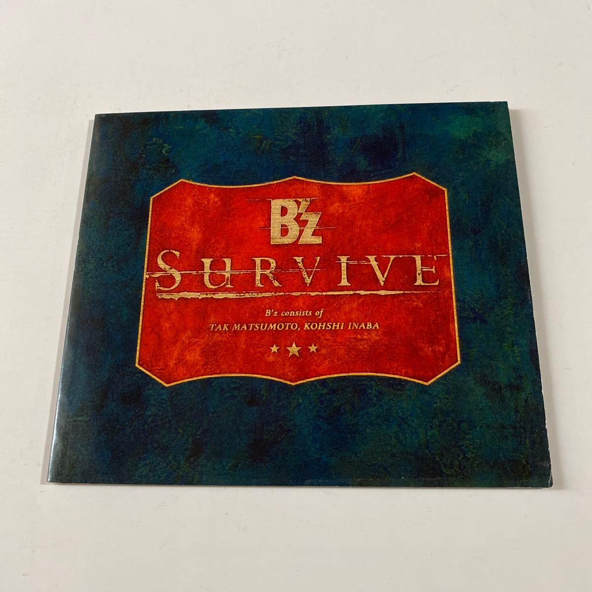 B'z 1CD「SURVIVE」写真集付き