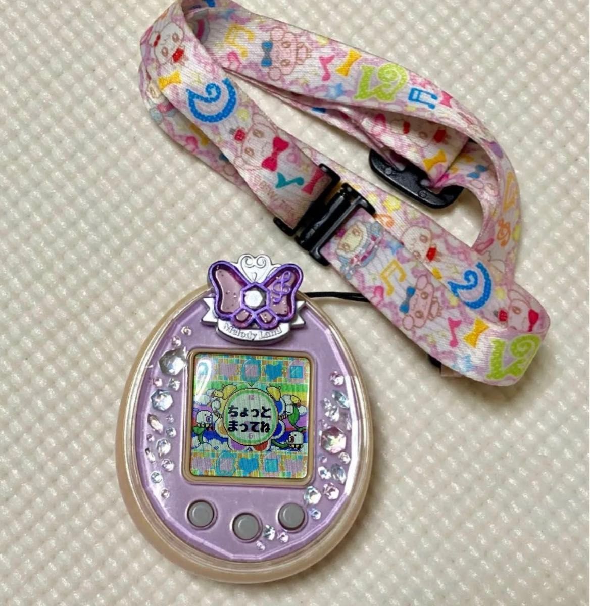 たまごっちピース パープル ピンク たまデコピアス メロディー たまごっちピース パープル ピンク たまデコピアス メロディー