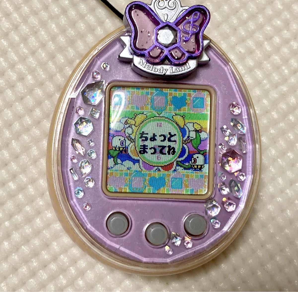 たまごっちピース パープル ピンク たまデコピアス メロディー たまごっちピース パープル ピンク たまデコピアス メロディー