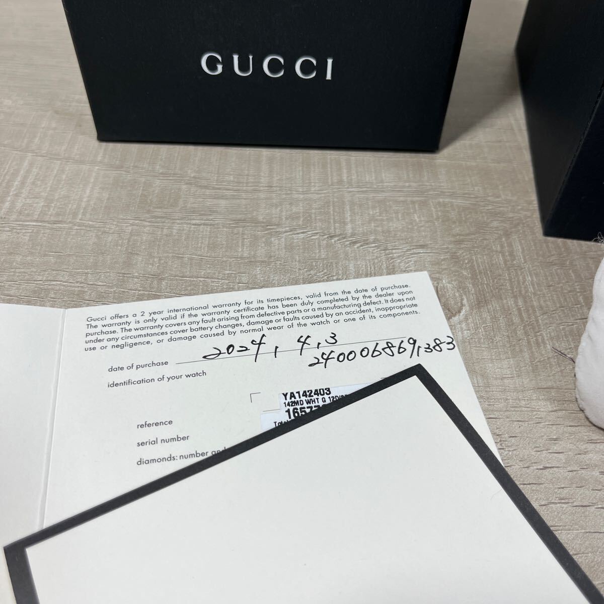 1円スタート売切り 新品未使用 GUCCI グッチ 腕時計 時計 YA142403 GG2570 ホワイト文字盤 シルバー 36mm ユニセックス 12Pダイヤ デイトの画像6