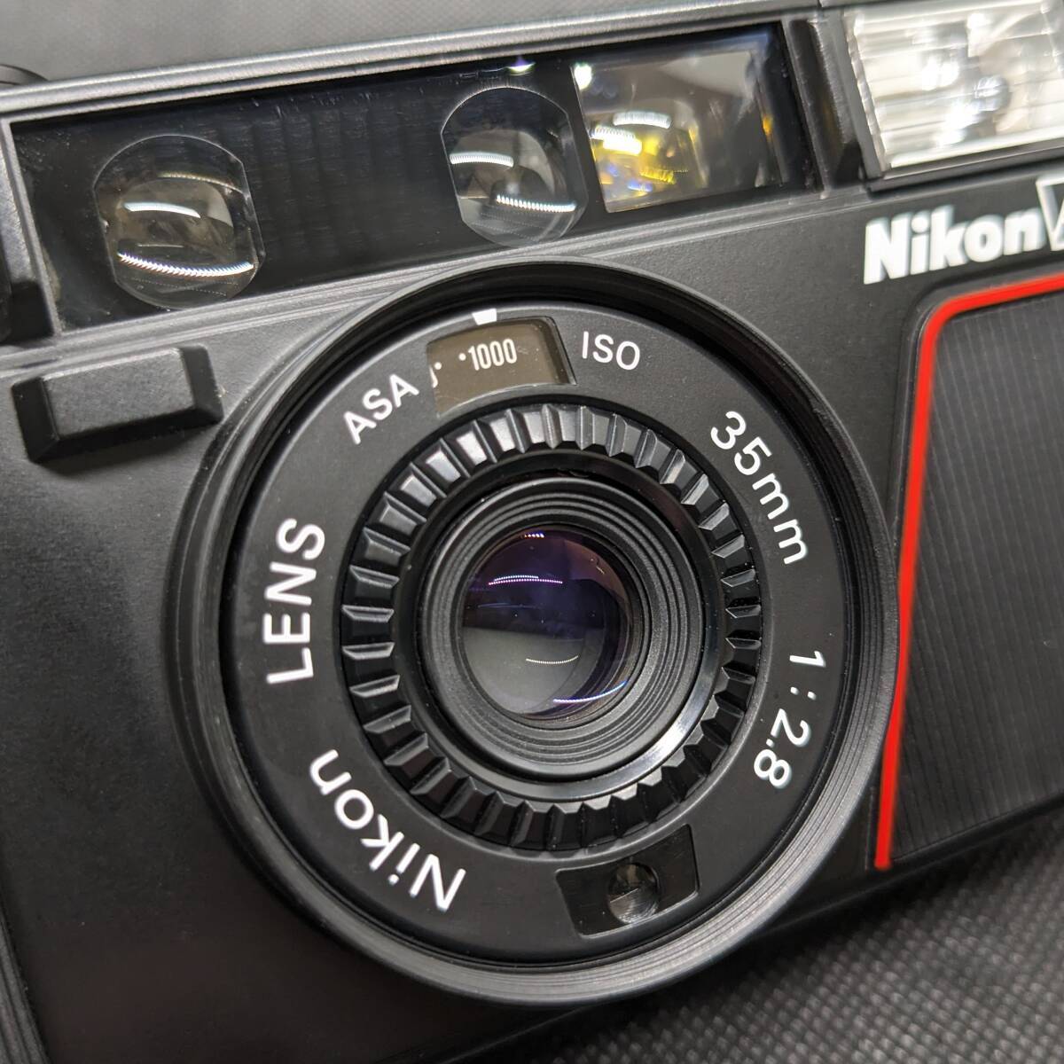1円スタート Nikon ニコン L35 AD ISO 1000 ニコン コンパクトフィルムカメラ レンズキャップ ケース付 ジャンク扱い_画像7