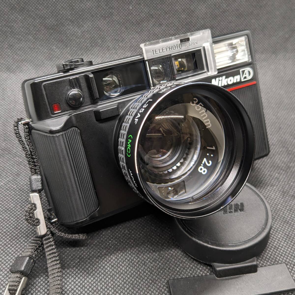 1円スタート Nikon ニコン L35 AD ISO 1000 ニコン コンパクトフィルムカメラ レンズキャップ ケース付 ジャンク扱い_画像8