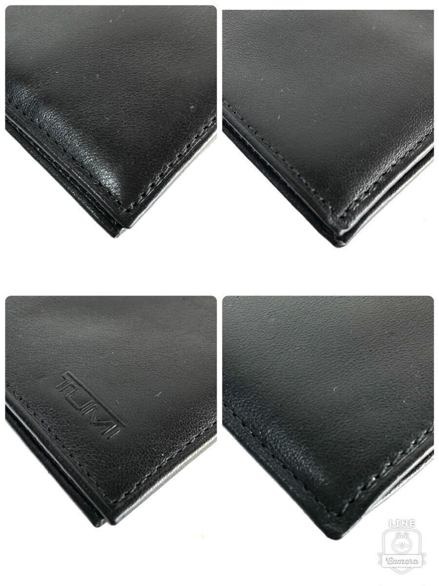 ■美品■TUMI トゥミ　二つ折り財布　カード入れ　パスケース　レザー　本革　ブラック　ロゴ型押し　タグあり_画像5