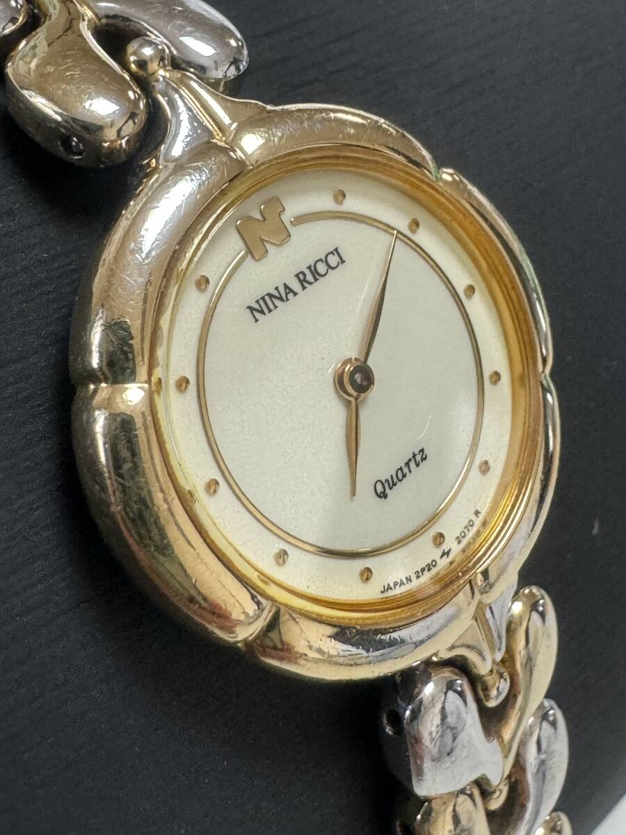 L378 rare * rare lady's wristwatch NINA RICCI/ Nina * Ricci 2P20-0500 quartz round 2 hands Gold bracele watch 