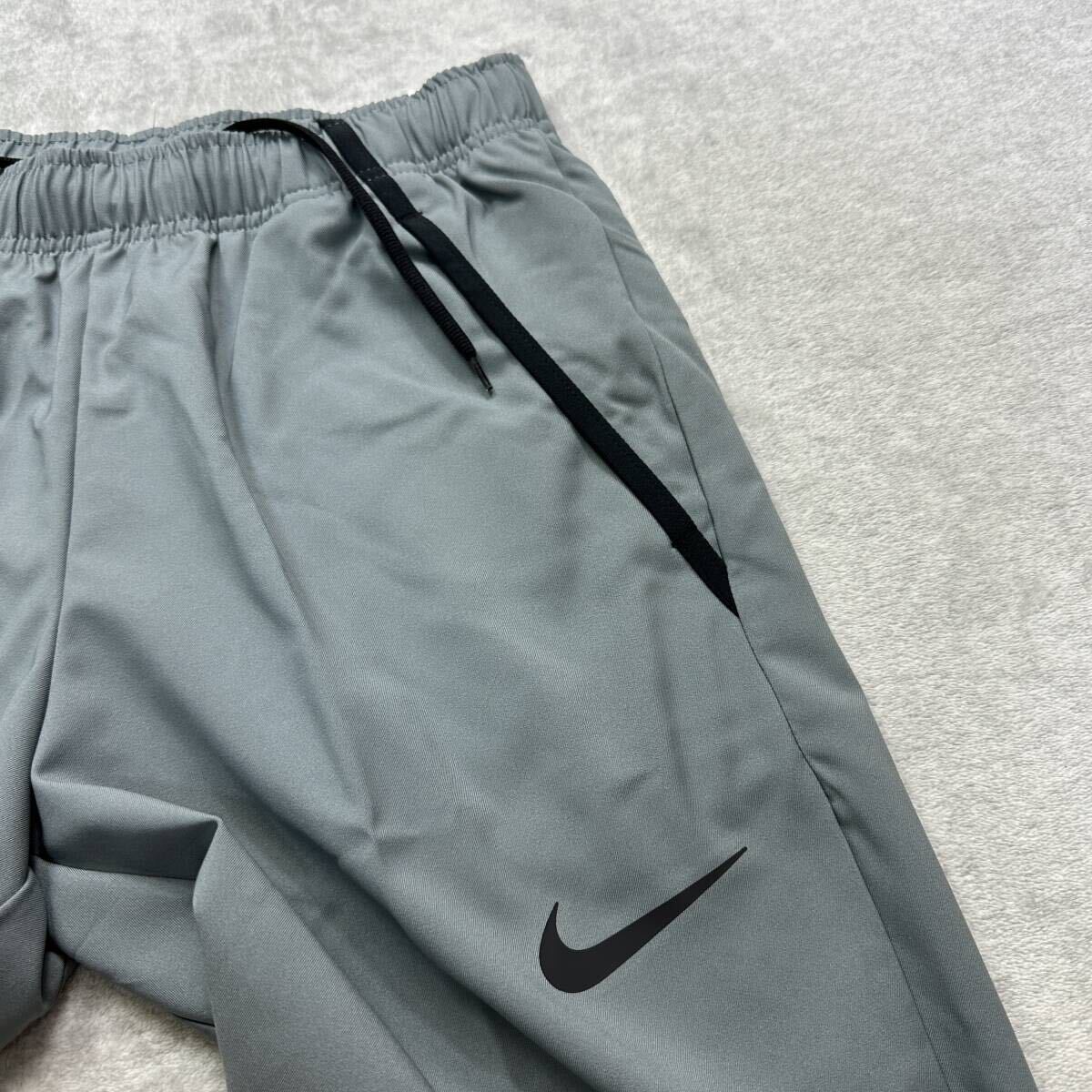 【格安送料】NIKE Mサイズ ナイキ ウーブン ボトムス ロングパンツ ジャージ 軽量 ジム トレーニング グレー 人気 Dri-FIT メンズ 正規品_画像3