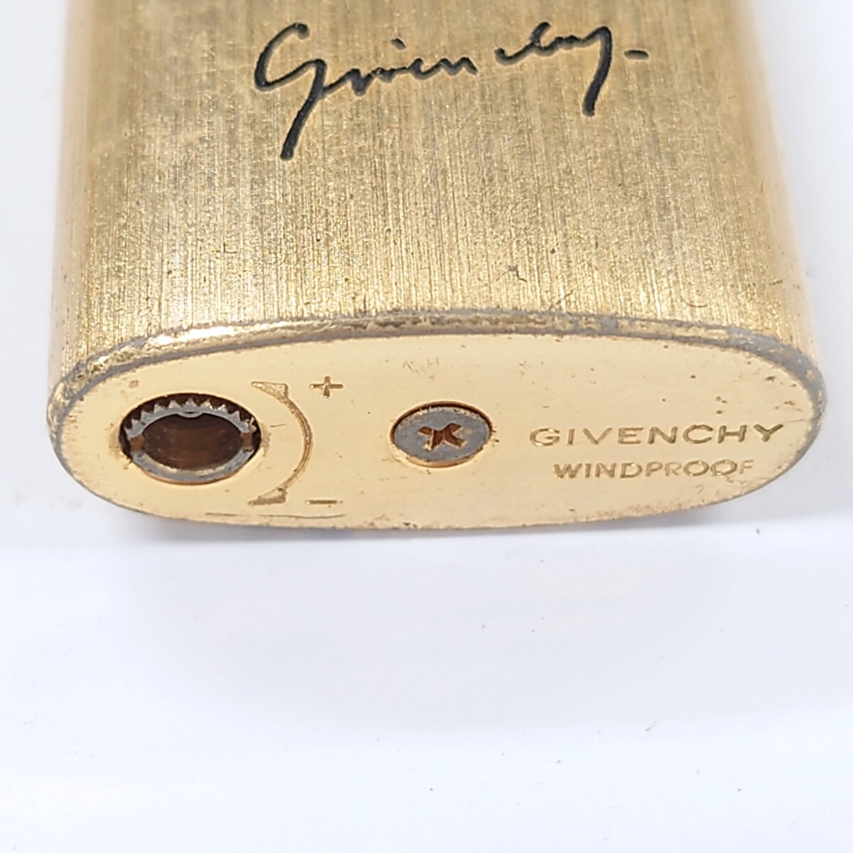 I1037 喫煙具 ライター GIVENCHY WINDPROOF ジバンシィ ジバンシー ゴールドカラー 中古 ジャンク品 訳あり_画像3