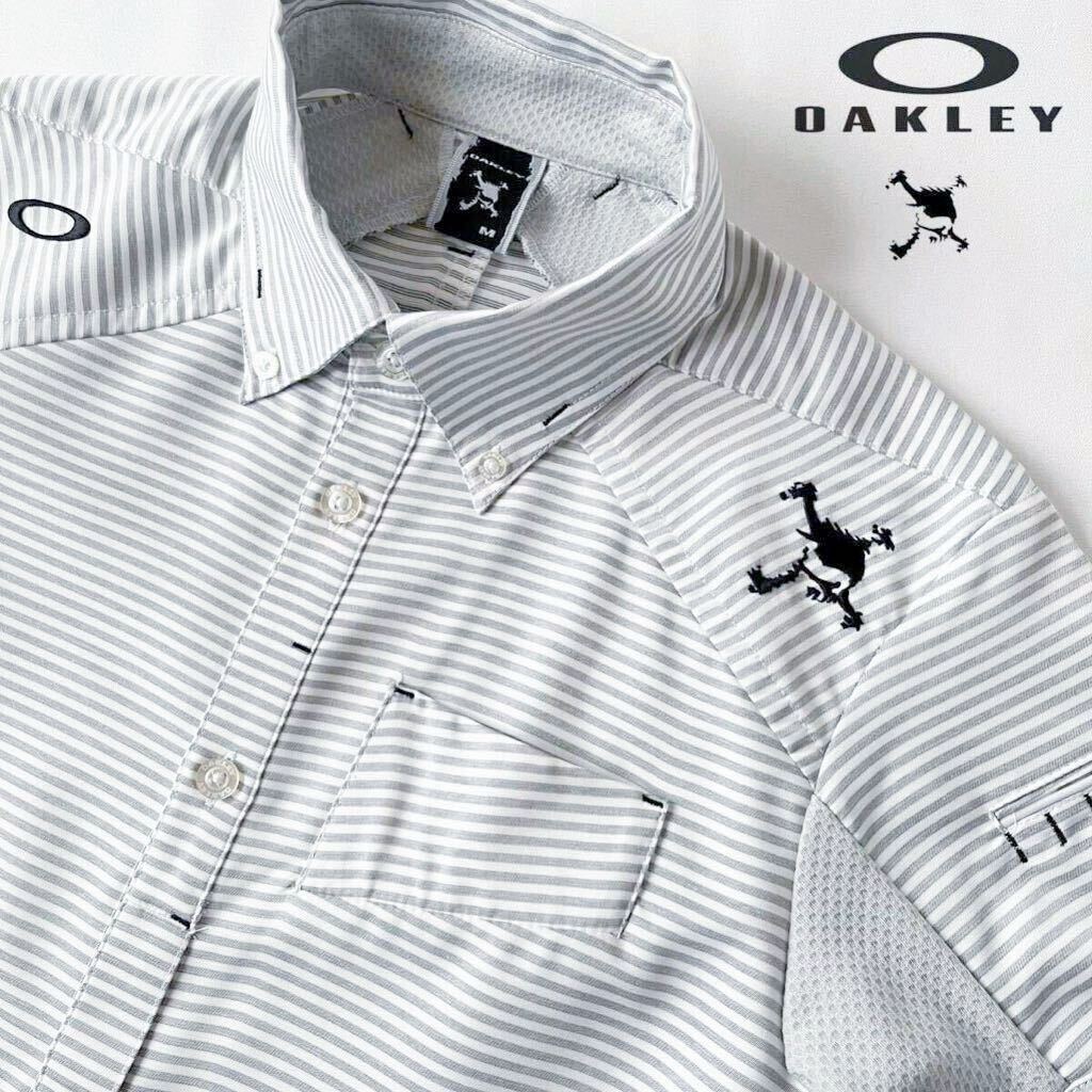 (美品) オークリー スカル OAKLEY SKULL 吸汗速乾 機能性 ボタンダウン ゴルフ シャツ M グレージユ ホワイト ブラック フルオープン の画像1