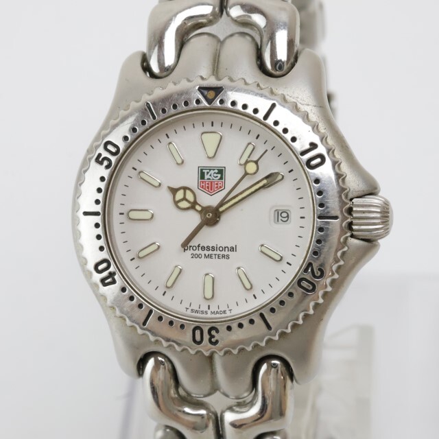2404-634 タグホイヤー クオーツ 腕時計 TAG HEUER S99 015 プロフェッショナル セル 日付 白文字盤 シルバーカラーの画像1