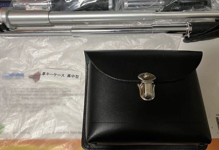  police goods police for leather case case black medium sized .. company .. member present goods new goods unused collection adjustment shoulder pouch original leather case 