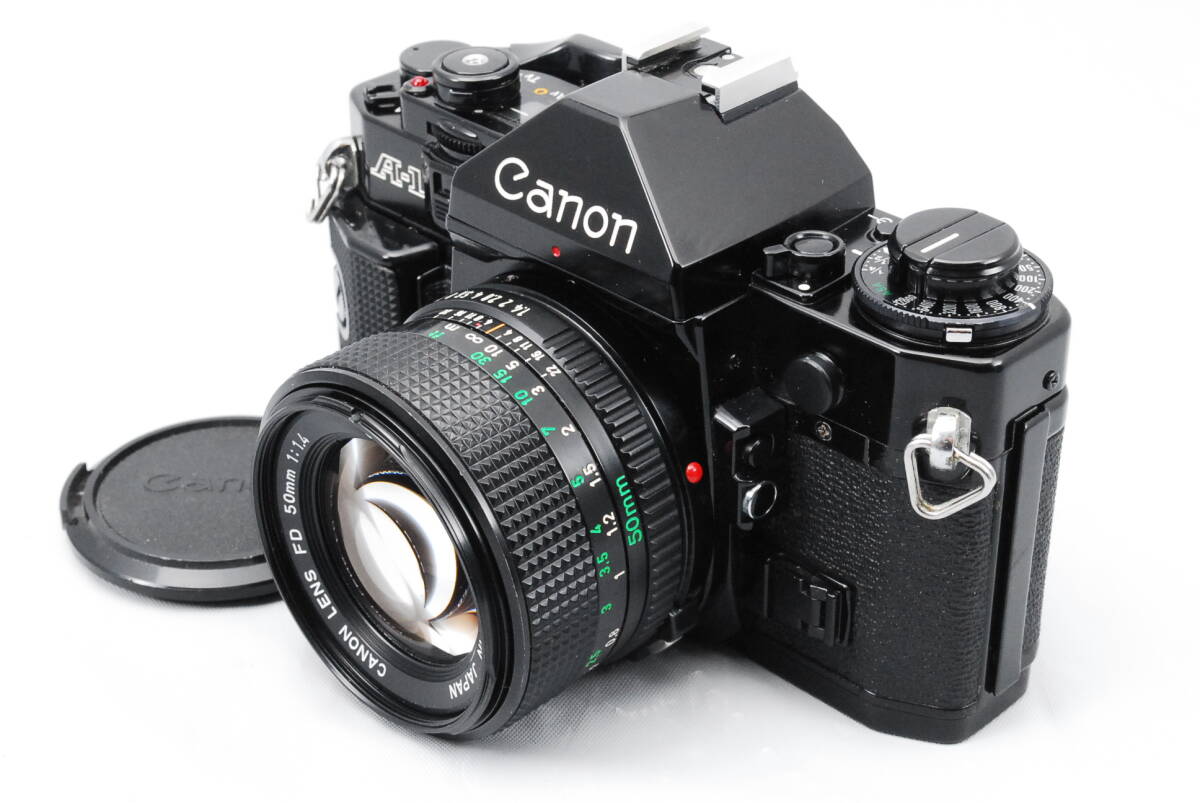 【意外と綺麗・シャッター鳴き無し】★キャノン・モルト新品交換済★ Canon A-1 #0642 + CANON LENS NEW FD 50㎜ f/1.4 #0643の画像1