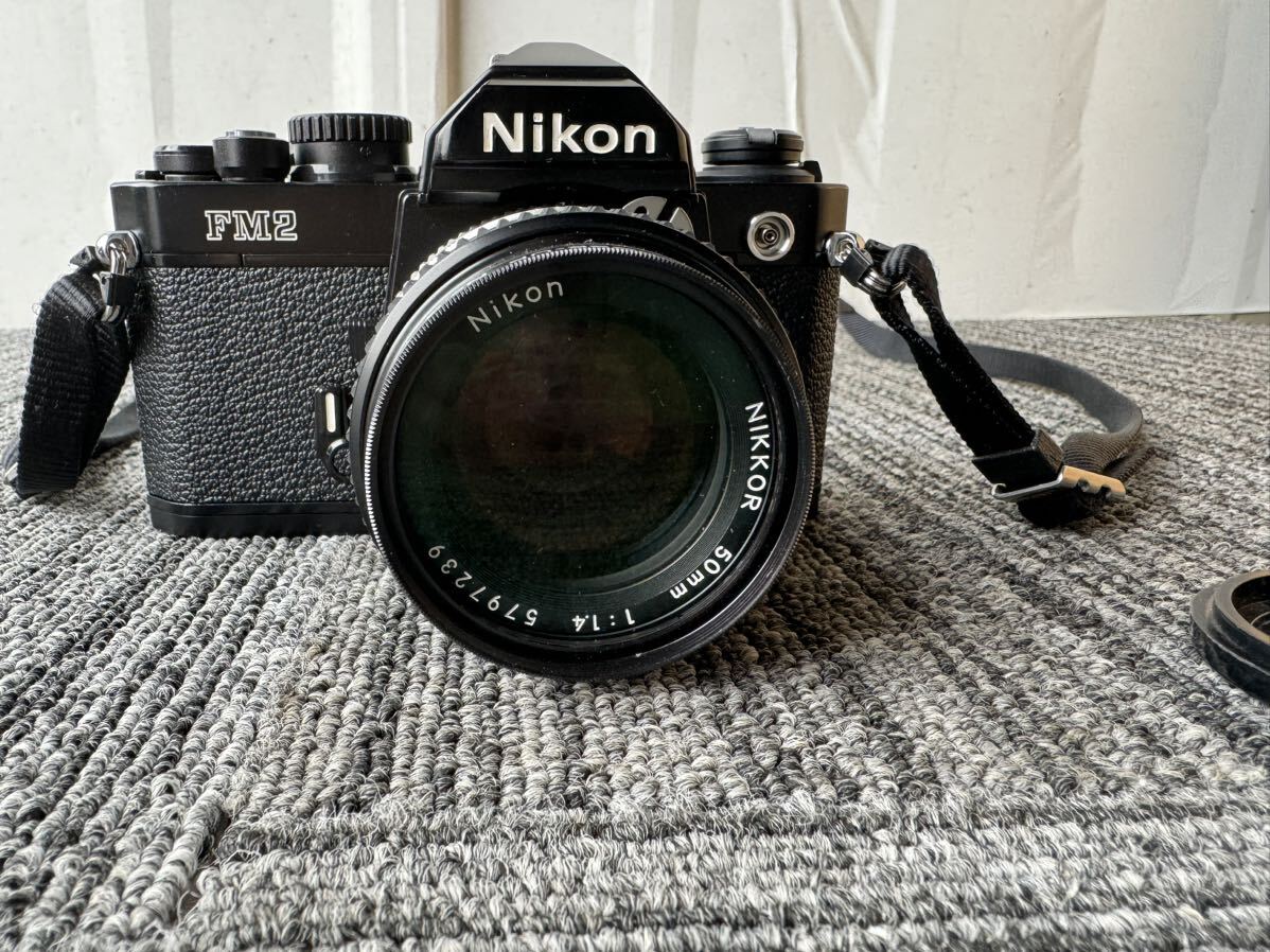 Nikon ニコン FM2 一眼レフ フィルムカメラレンズNikon NIKKOR 50mm 1:1.4 5797239 革ケース付 ジャンクの画像3